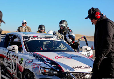 Alan McCalllum exiting the Barrett Jackson #79 Lexus IS250 of N1 Racing